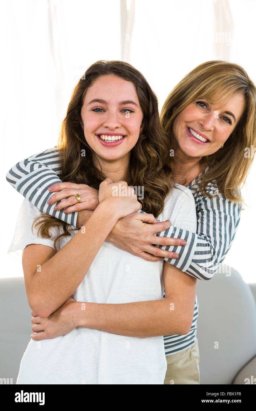 mother embrace her daughter Stock Photo