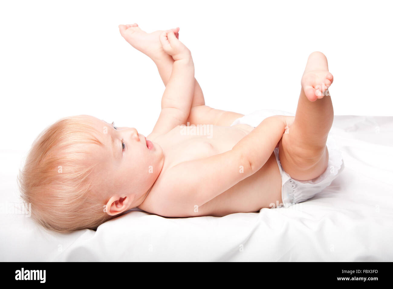 Cute infant laying on back Stock Photo Alamy