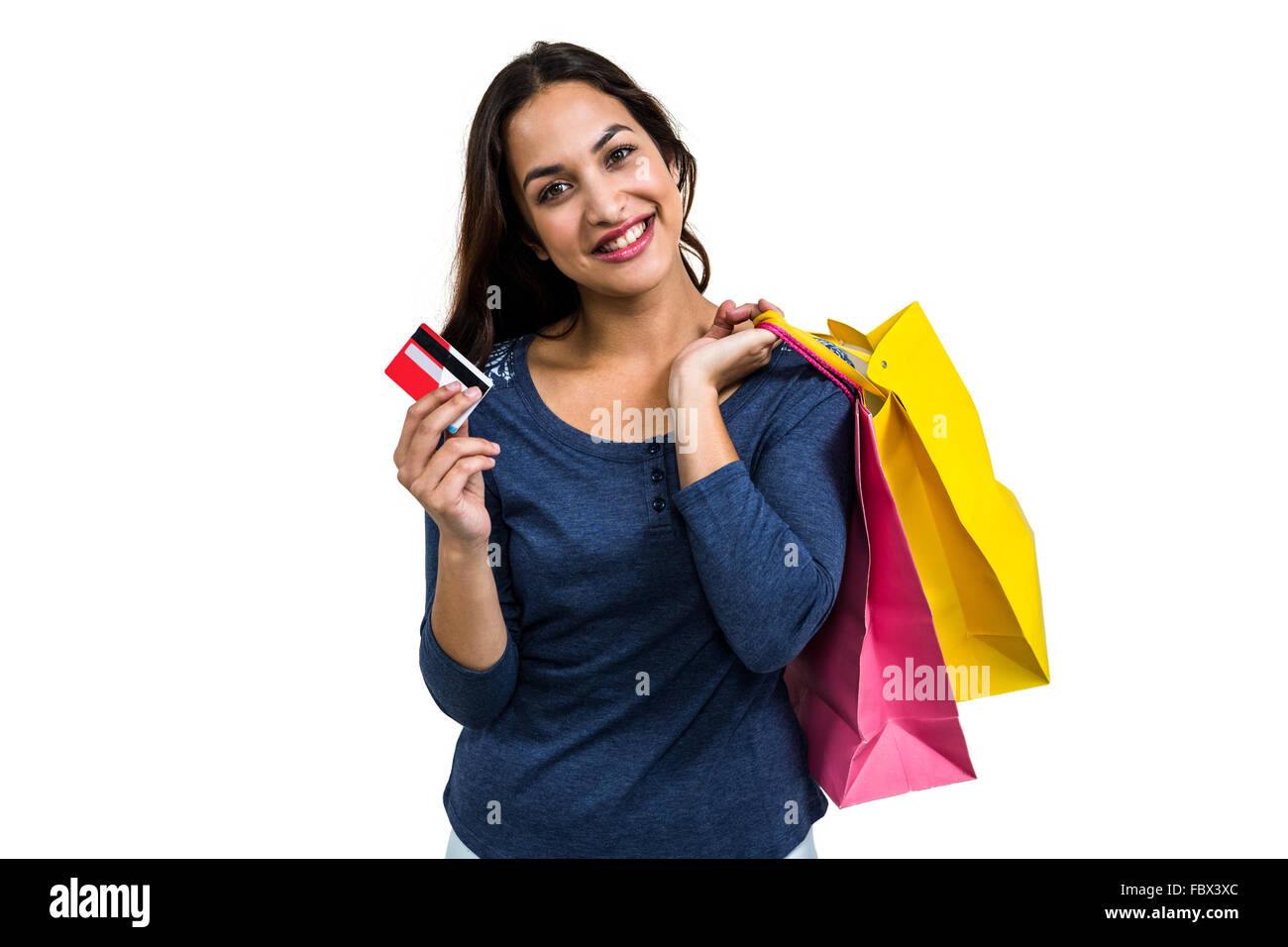 Portrait of happy young woman with shopping bags and payment card Stock Photo