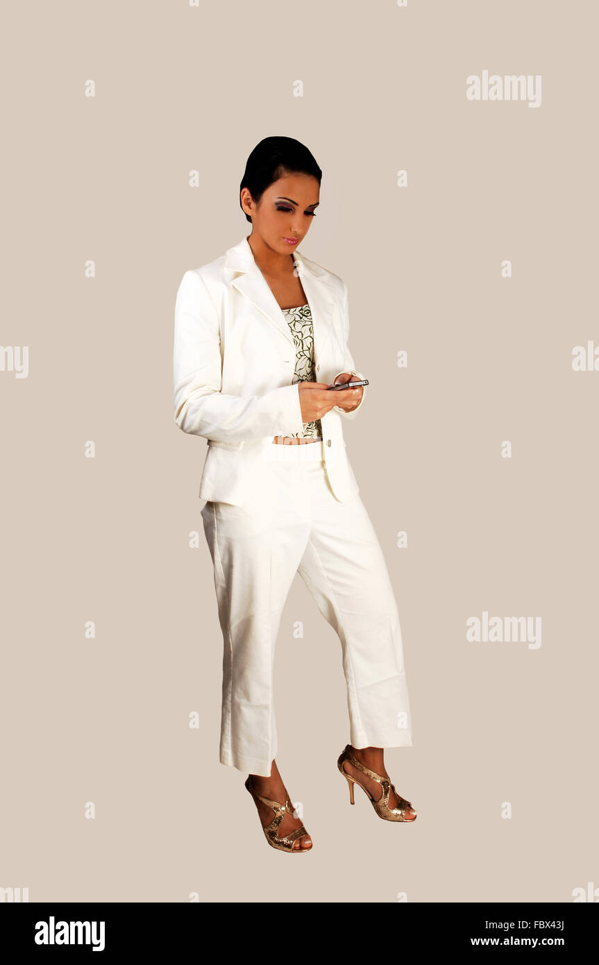 Girl in white suit Stock Photo Alamy