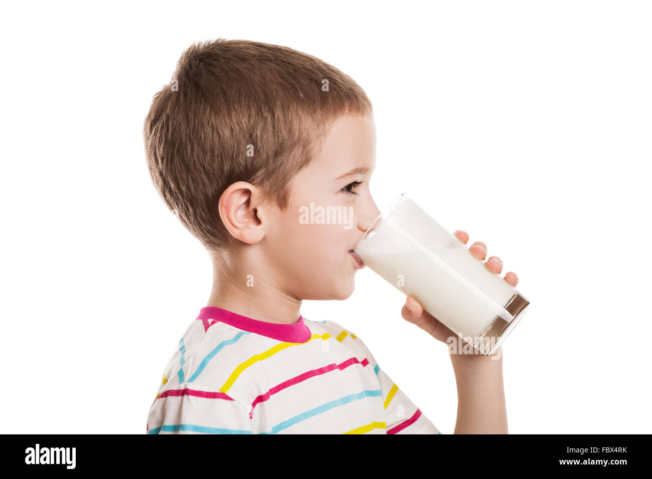 Smiling child boy drinking milk Stock Photo