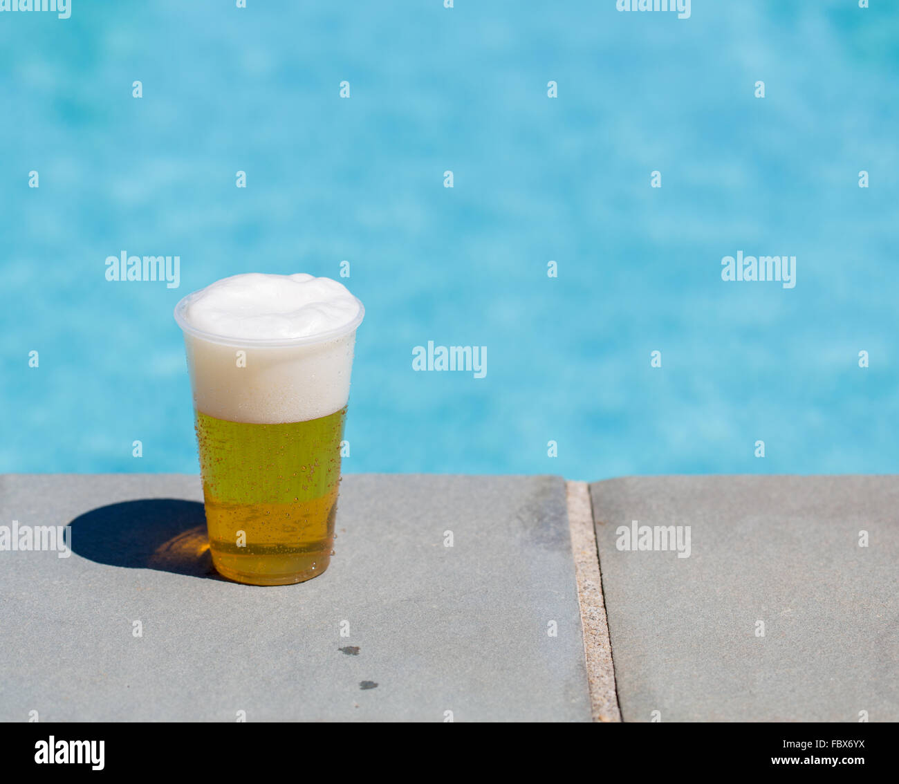 Beer in a plastic cup Stock Photo by Ha4ipuri