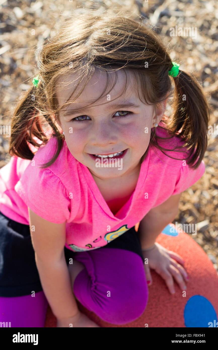Cute little girl with pigtails Stock Photo