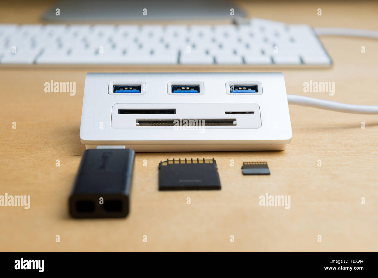 silver usb 3.0 extender with universal memory card slots hub, SD card, mini SD card, CF card Stock Photo