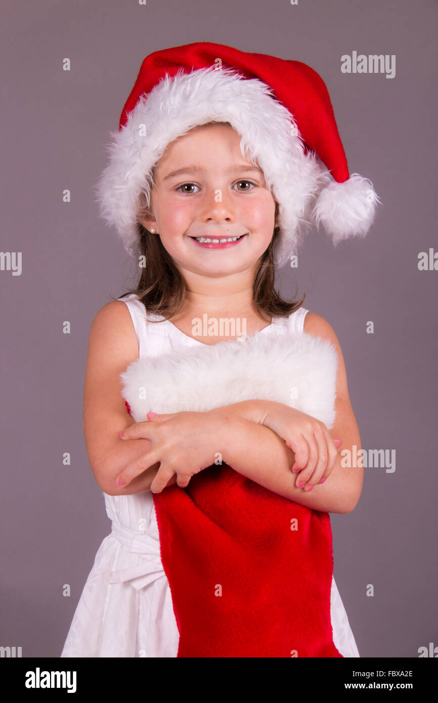 Little girl with her Christmas sock Stock Photo Alamy