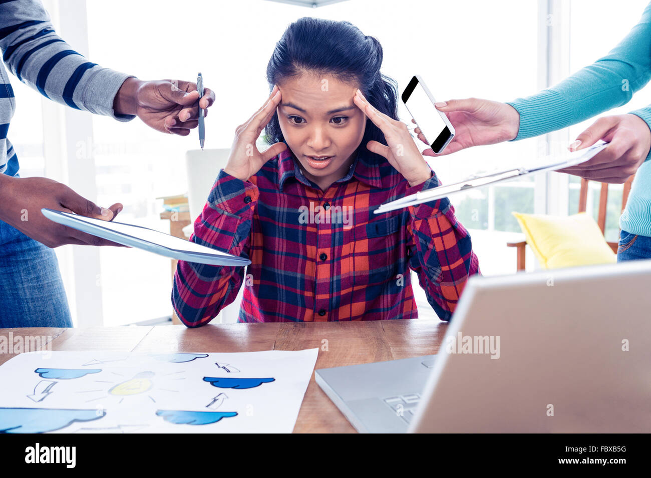 Stressful businesswoman looking down Stock Photo