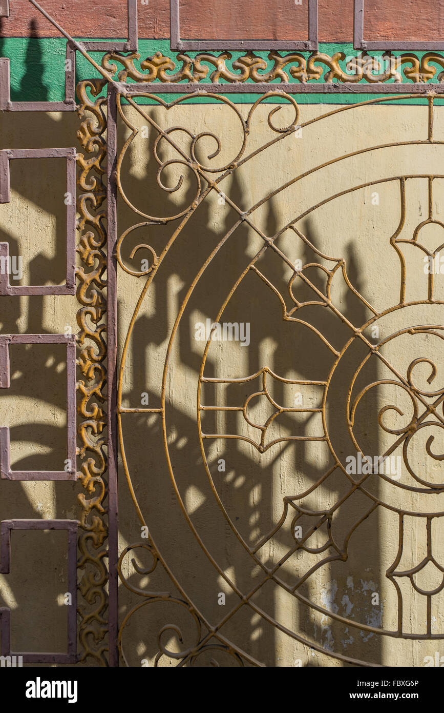 An ornate front gate showing Buddhist Auspicious symbol at  the small Monastery in town,  Bomdila, Arunachal Pradesh, India. Stock Photo