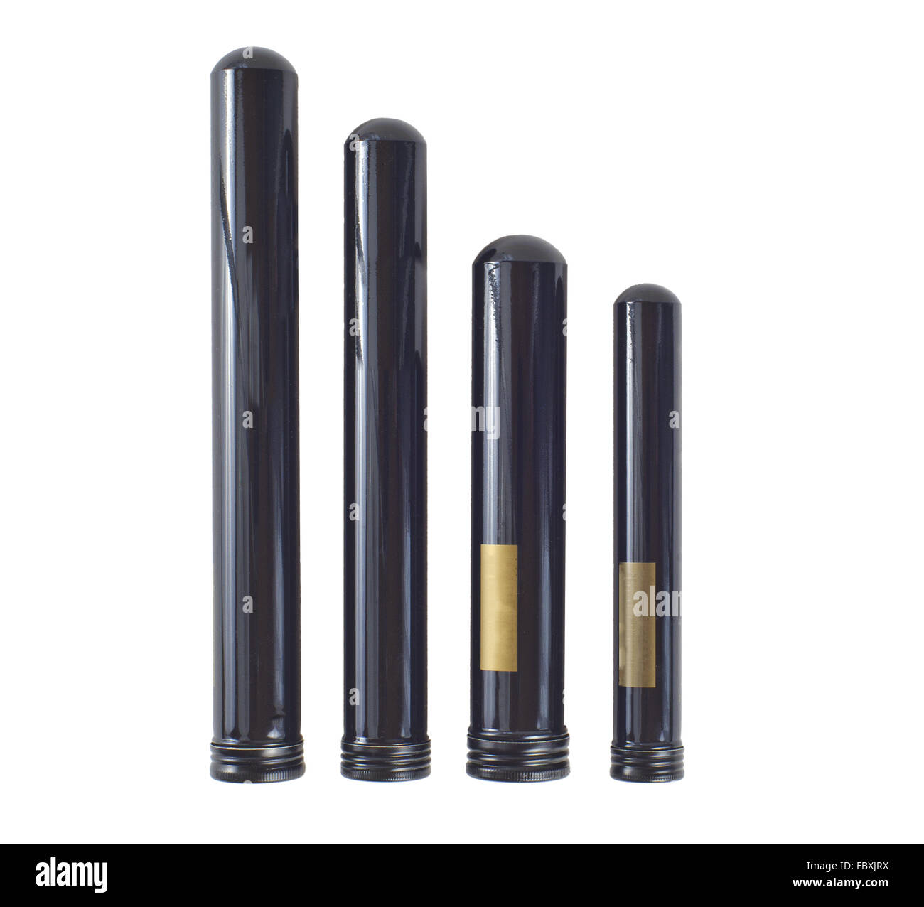 four different large black cigar tubes Stock Photo