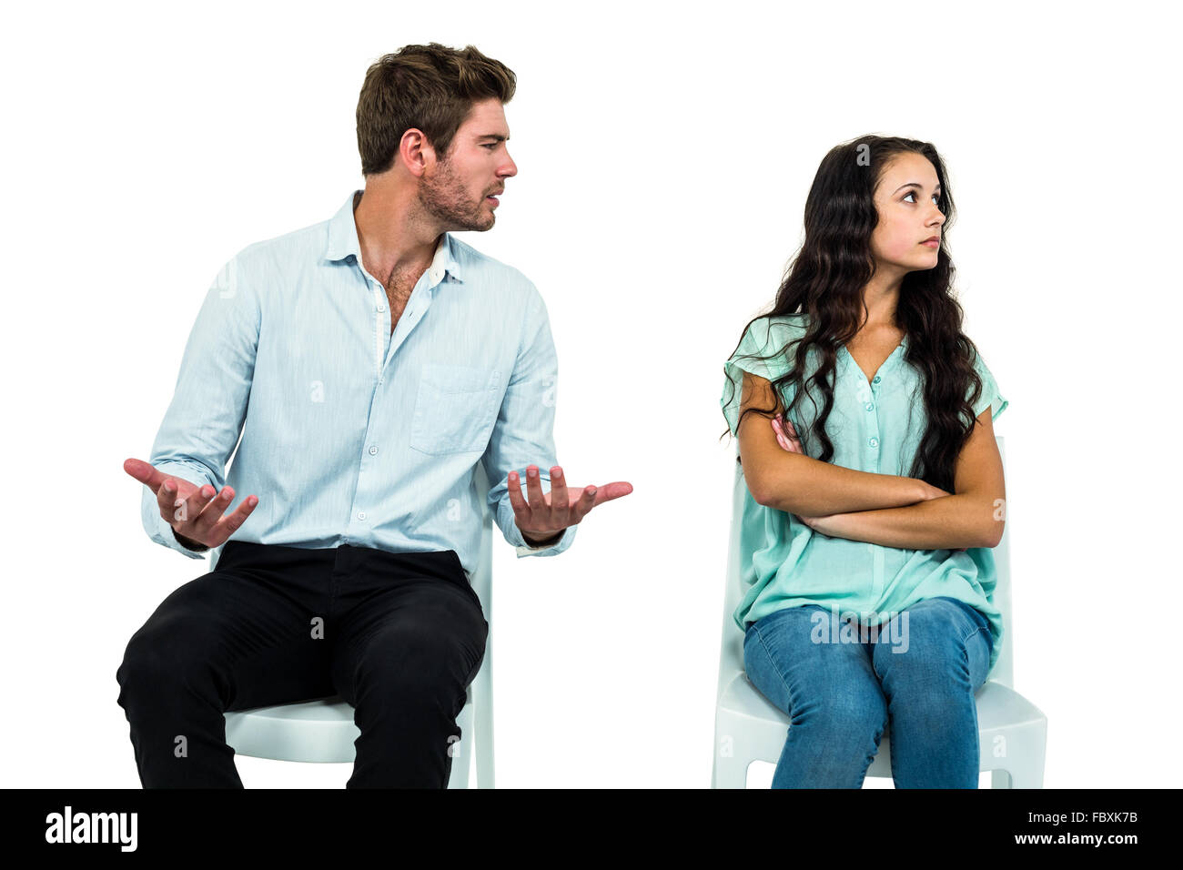Couple sitting on chairs hi-res stock photography and images - Alamy