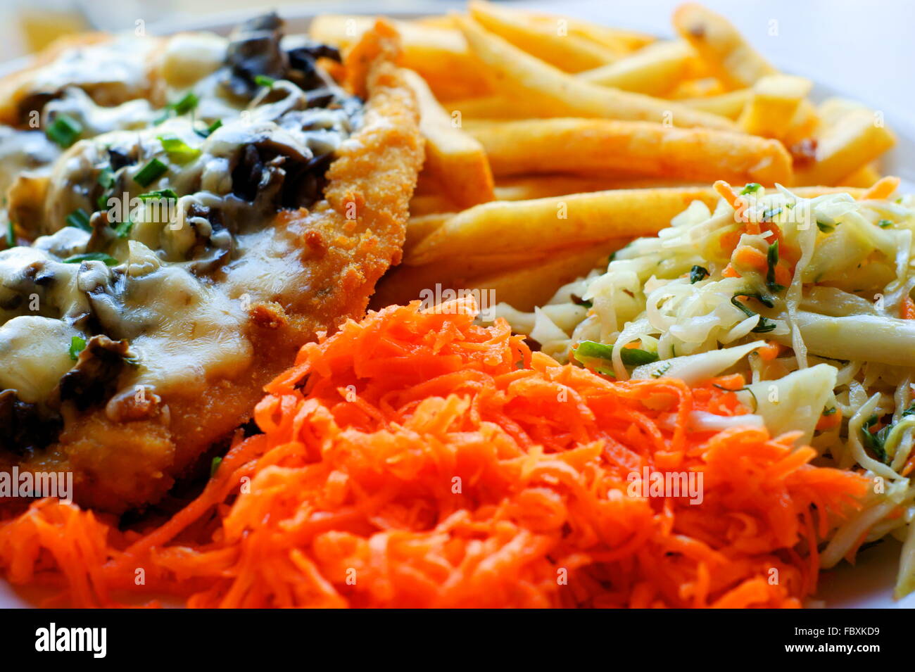 chicken steak with fries / chips and salad Stock Photo