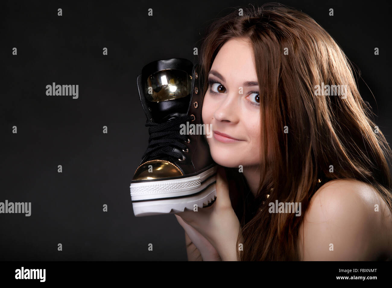 Girl with casual shoe. Women loves shoes concept Stock Photo Alamy