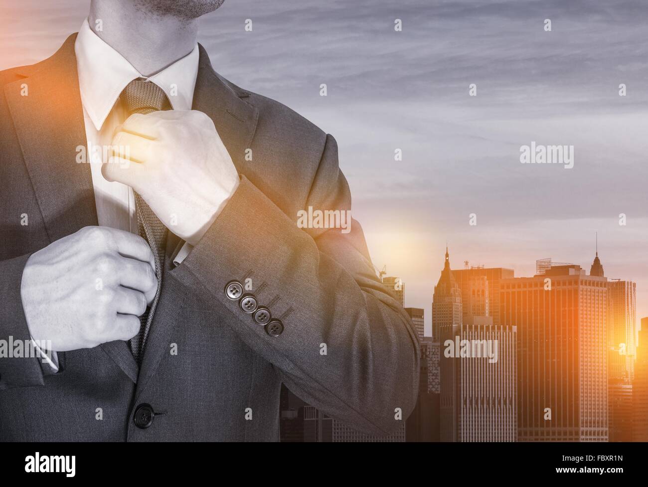 Preparing For Work Concept. Young Office Worker in Elegant Suit Making Last Preparation For Potentially Successful Day in His Of Stock Photo