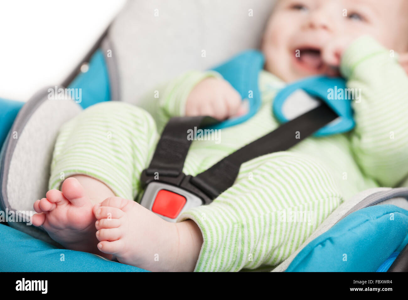 Little baby child in safety car seat Stock Photo