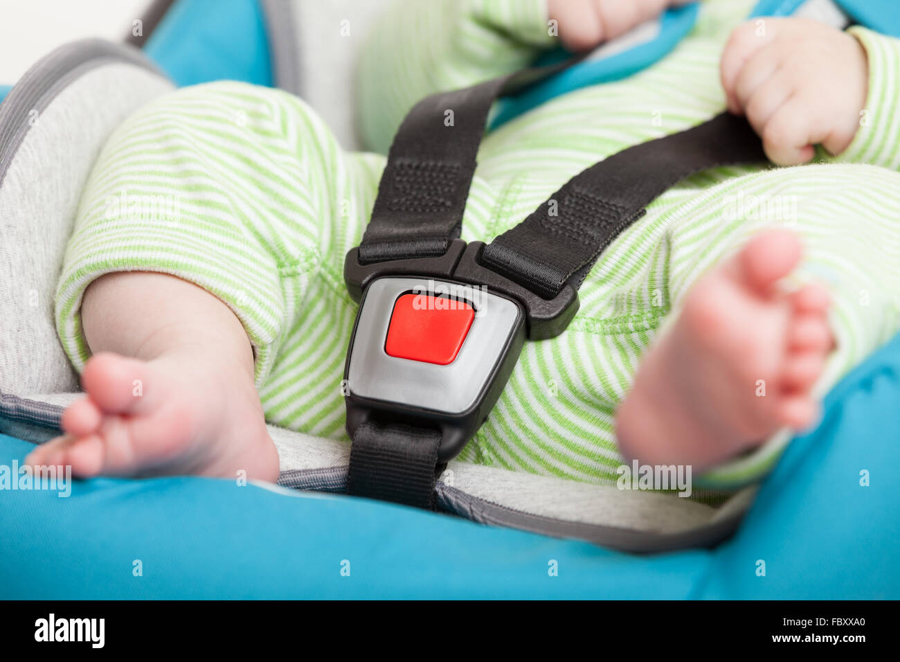 Little baby child in safety car seat Stock Photo