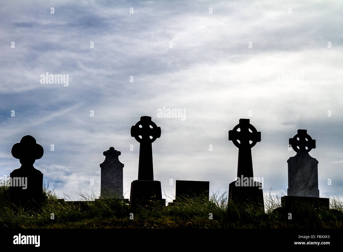 Irish cemetery with Celtic cross Stock Photo