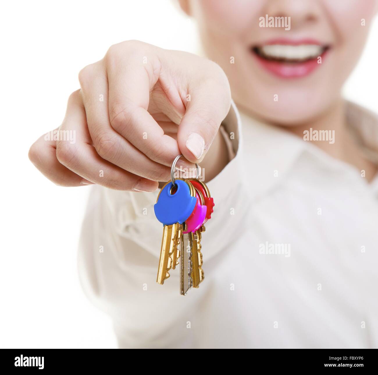 Happy woman real estate agent holding set of keys to new house Stock ...