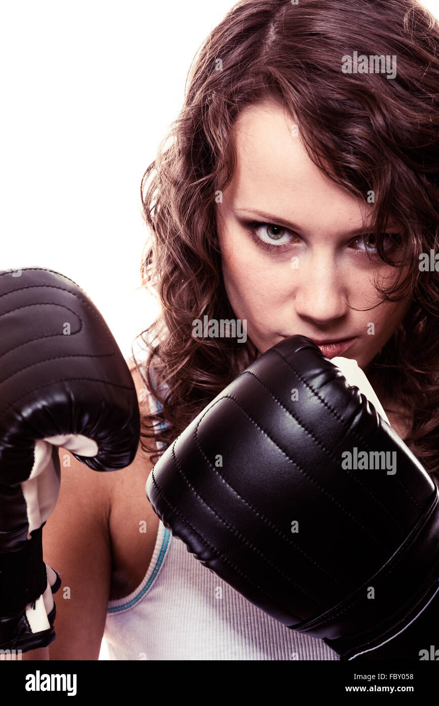 Sport boxer woman in black gloves. Fitness girl training kick boxing