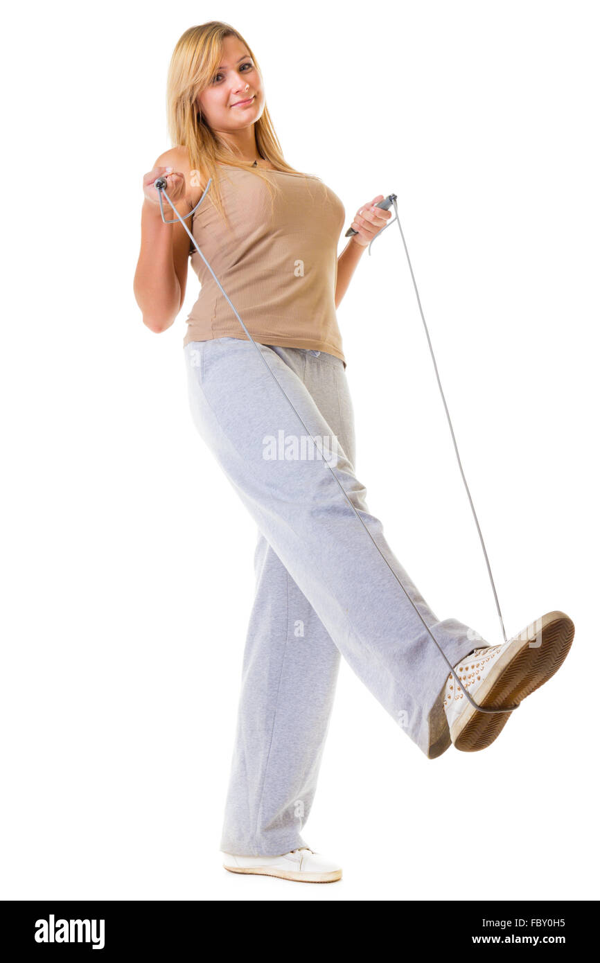 Sport girl fitness woman doing exercise with skip jump rope isolated Stock Photo