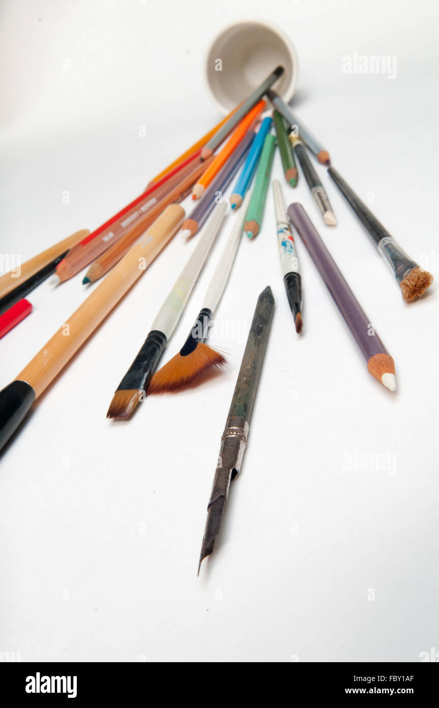 Selection of artists tools on a white background Stock Photo - Alamy
