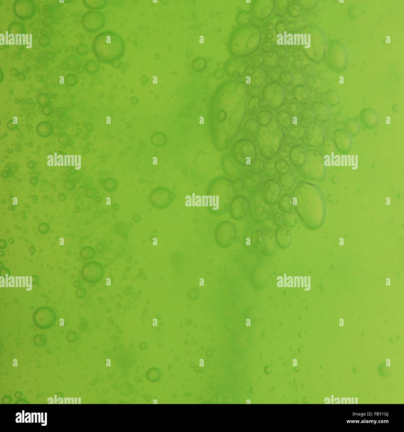 soap bubbles green liquid background Stock Photo - Alamy