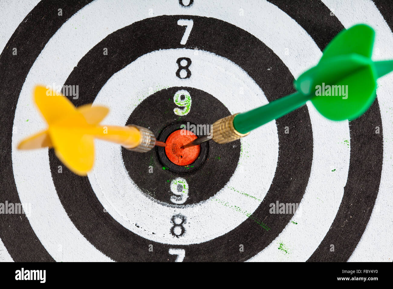 Bullseye. Black and white target with darts as sport background Stock