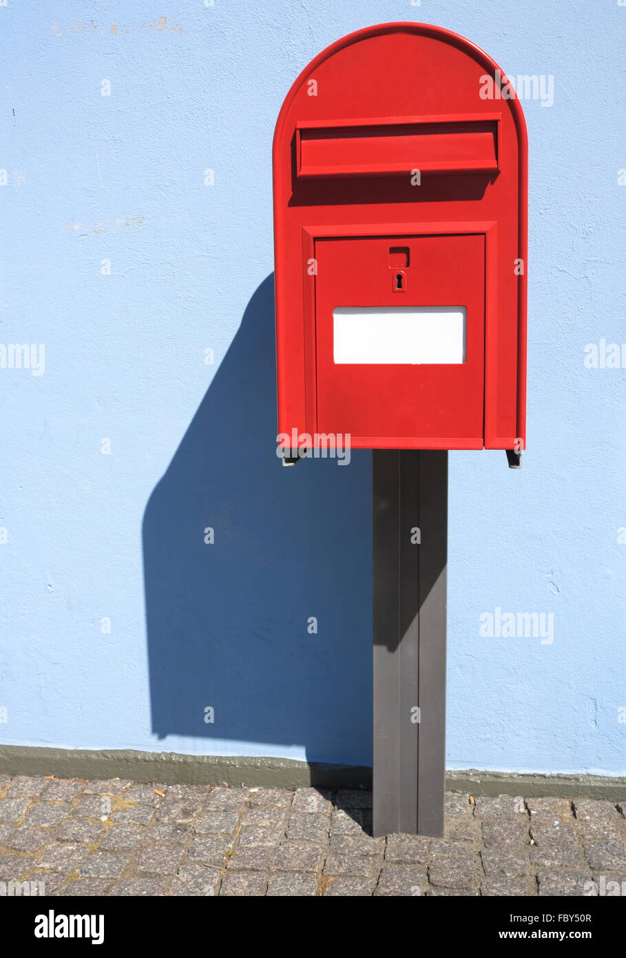 red postbox letterbox on the street Stock Photo Alamy