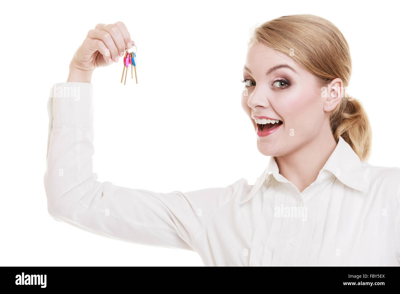 Happy woman real estate agent holding set of keys to new house Stock ...