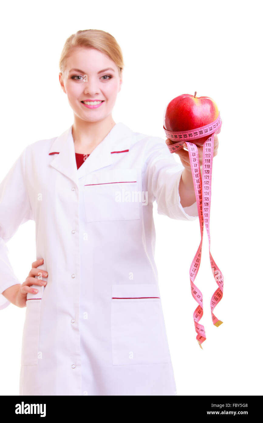 Woman in white lab coat healthy food. Doctor dietitian