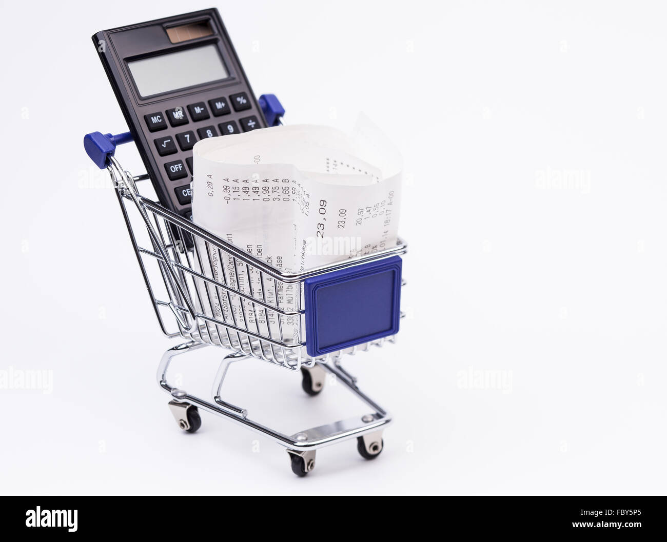 Shopping till receipt calculator and cart Stock Photo