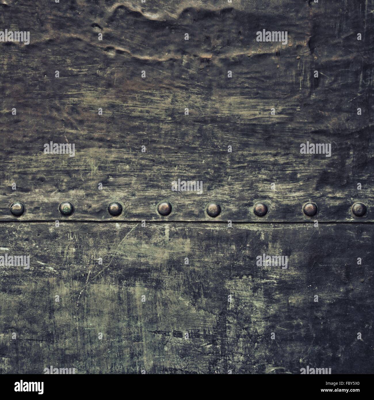 Grunge black metal plate with rivets screws background texture Stock ...