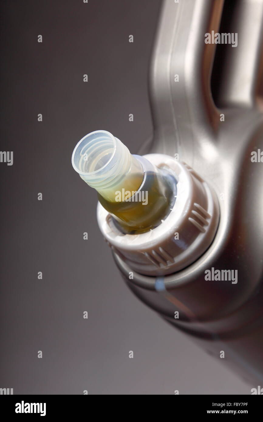 Can with car engine oil black background Stock Photo Alamy