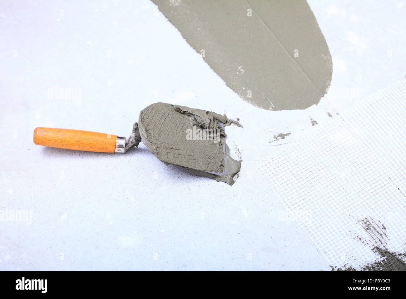 construction trowel with mortar for tiles work Stock Photo Alamy