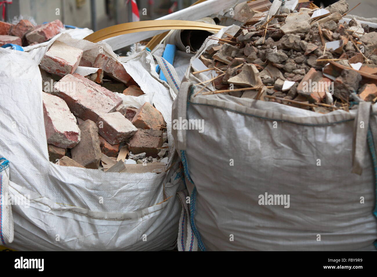 Full construction waste debris bags Stock Photo Alamy
