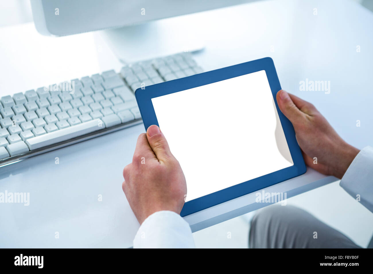 Businessman using his tablet Stock Photo