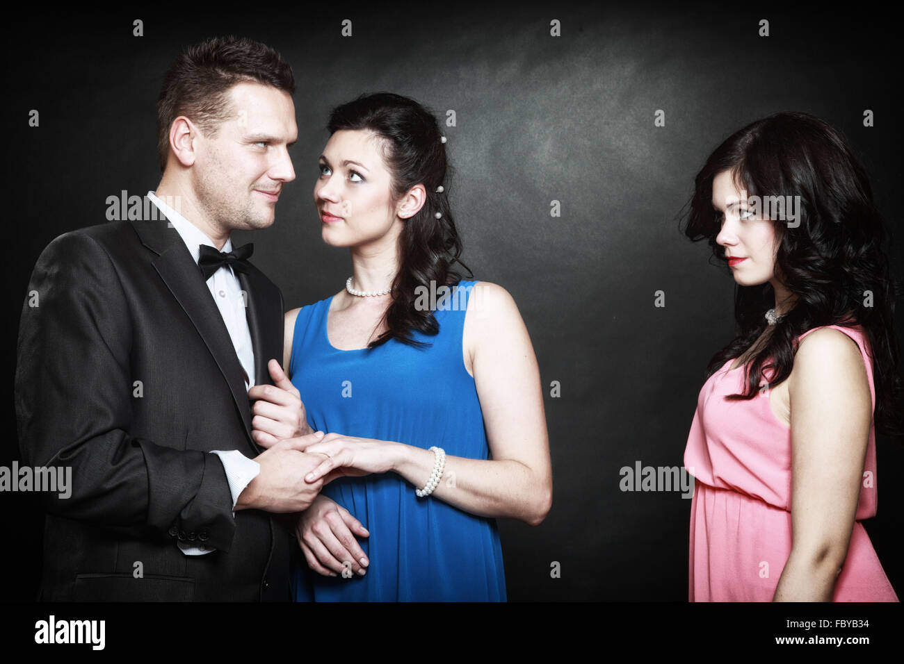 marital infidelity concept. Love triangle passion hate Stock Photo
