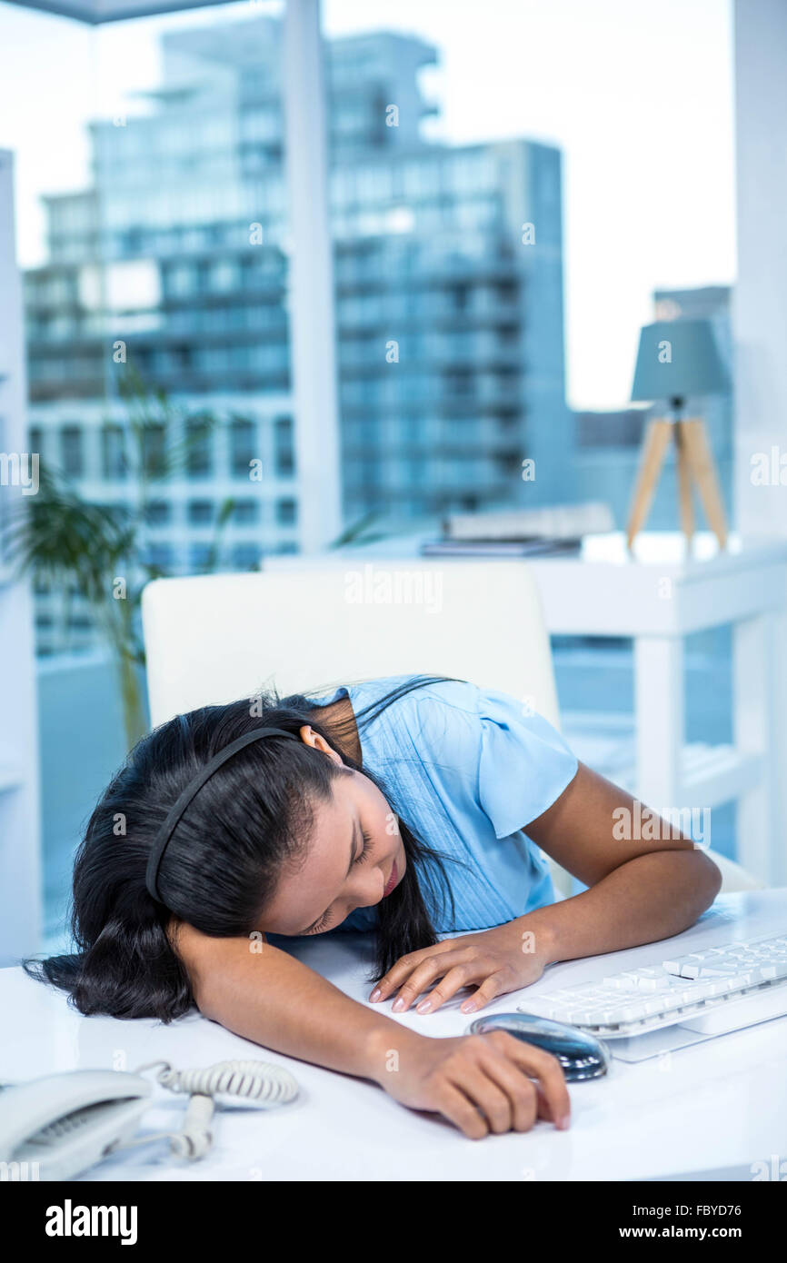 Tired businesswoman sleeping at her desk Stock Photo - Alamy