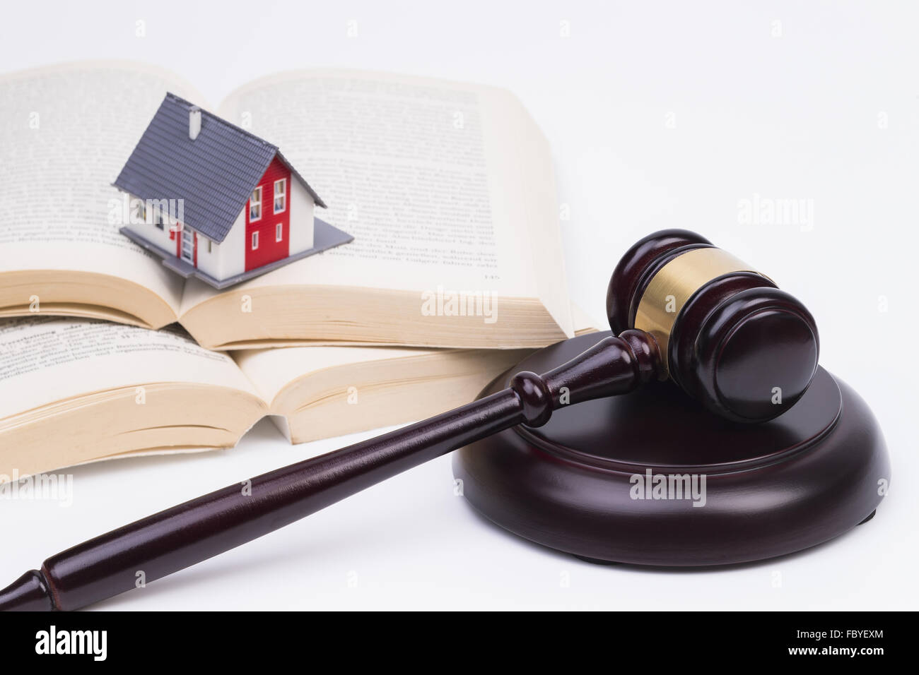Wooden gavel and house Stock Photo