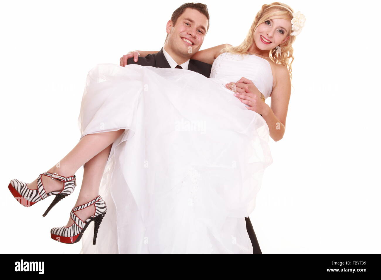 Portrait of happy bride and groom on white background Stock Photo - Alamy