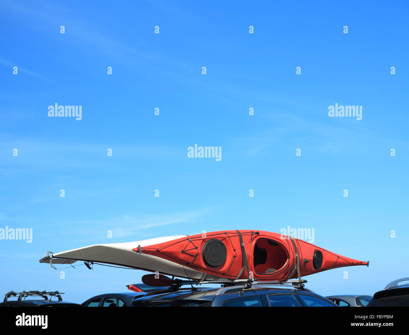 car with kayak canoe on top blue sky. Active lifestyle Stock Photo Alamy