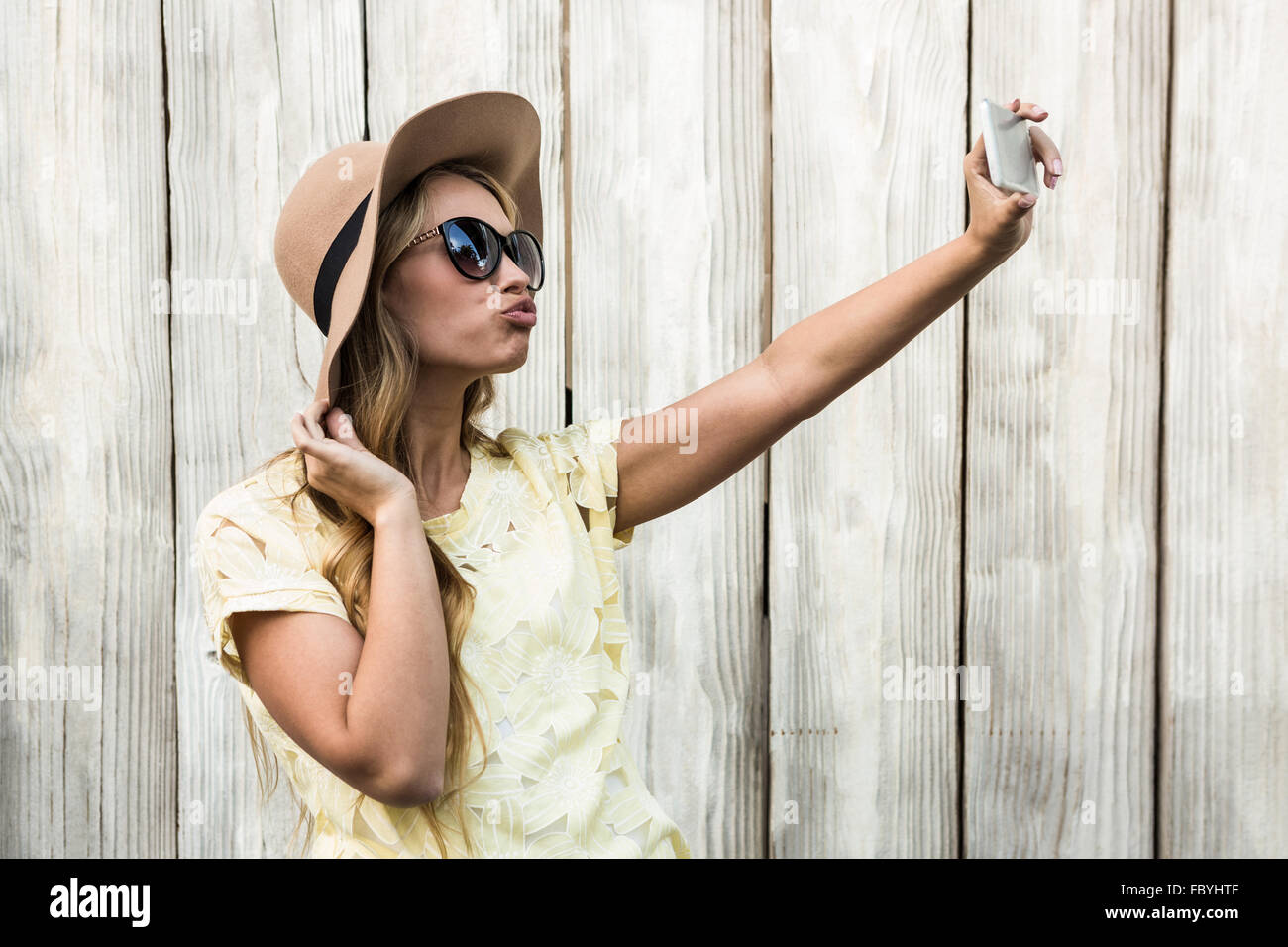 Happy woman taking a selfie Stock Photo