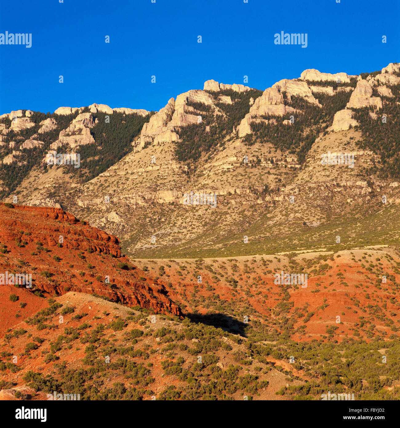 red hills below cliffs in the pryor mountains near bighorn canyon east of warren, montana Stock Photo