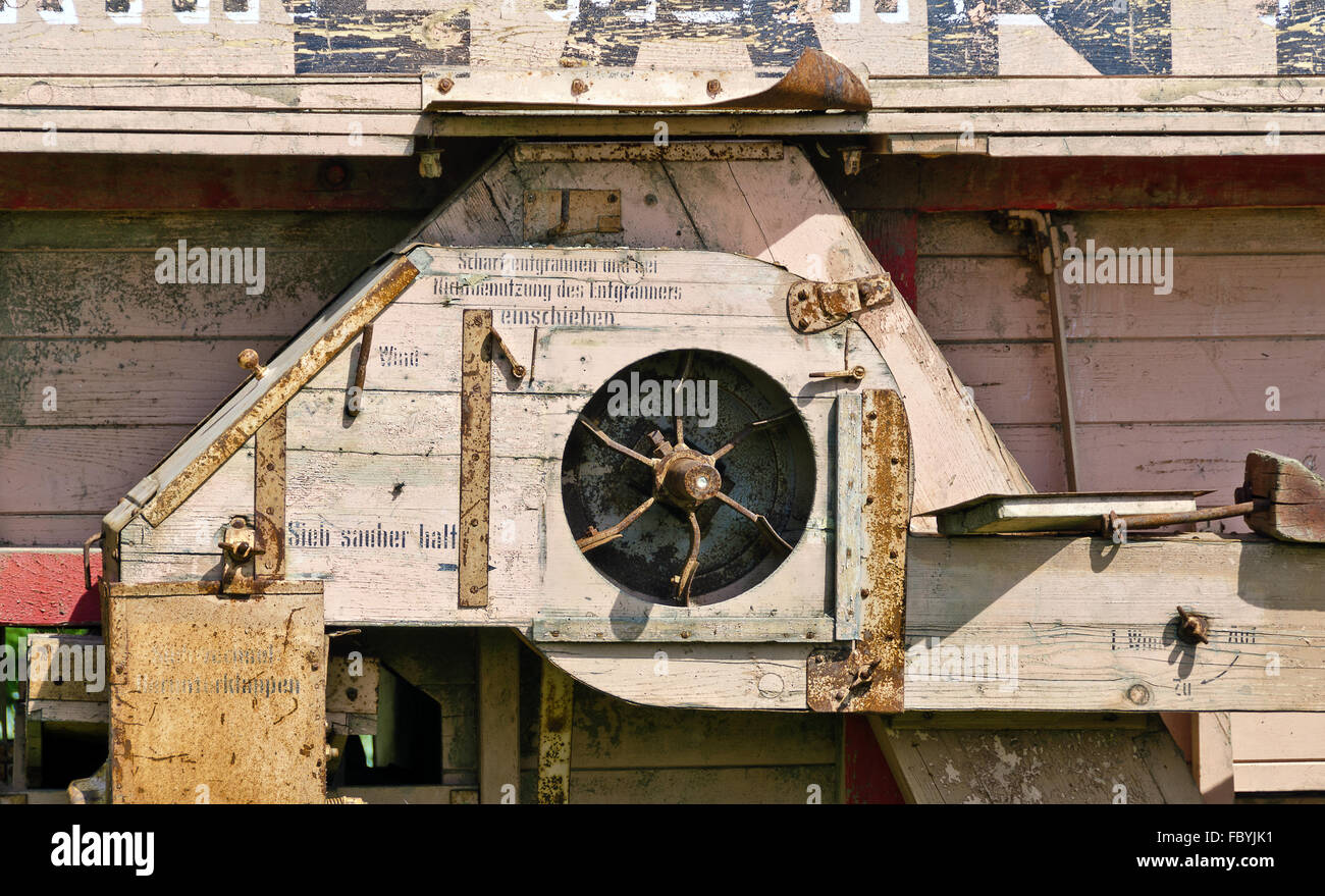 old wooden thresher with de-awning part Stock Photo