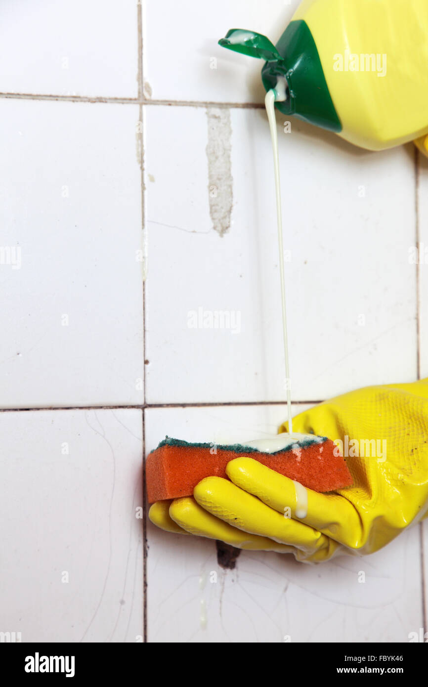 Cleaning of dirty old tiles in a bathroom Stock Photo Alamy