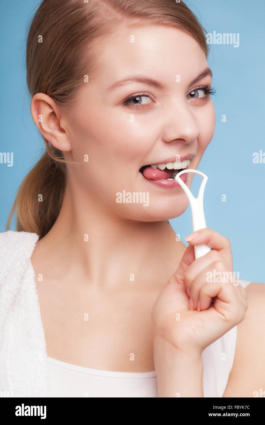 Girl cleaning tongue. Dental care oral hygiene Stock Photo Alamy