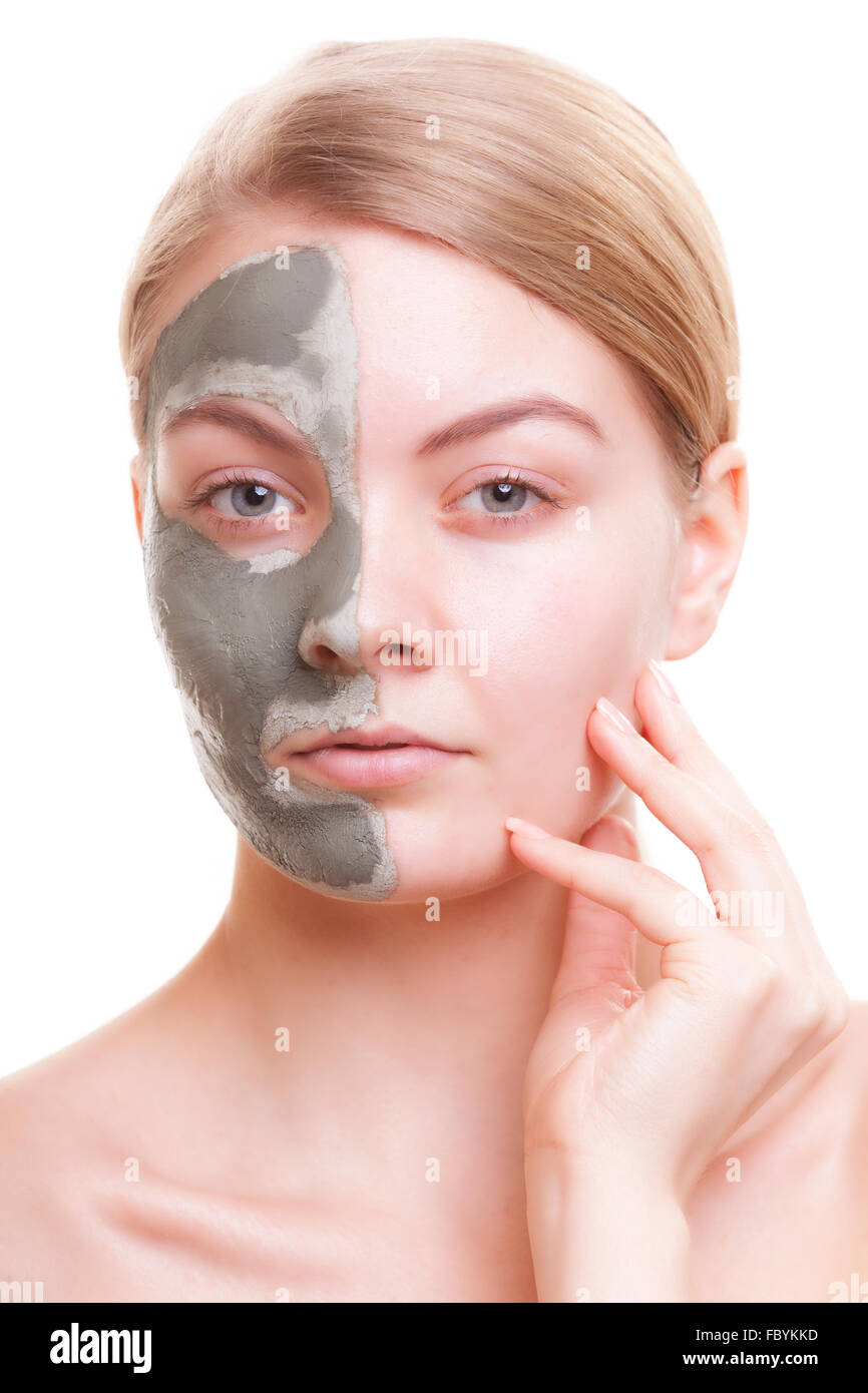 Skin care. Woman applying clay mask on face. Spa Stock Photo Alamy