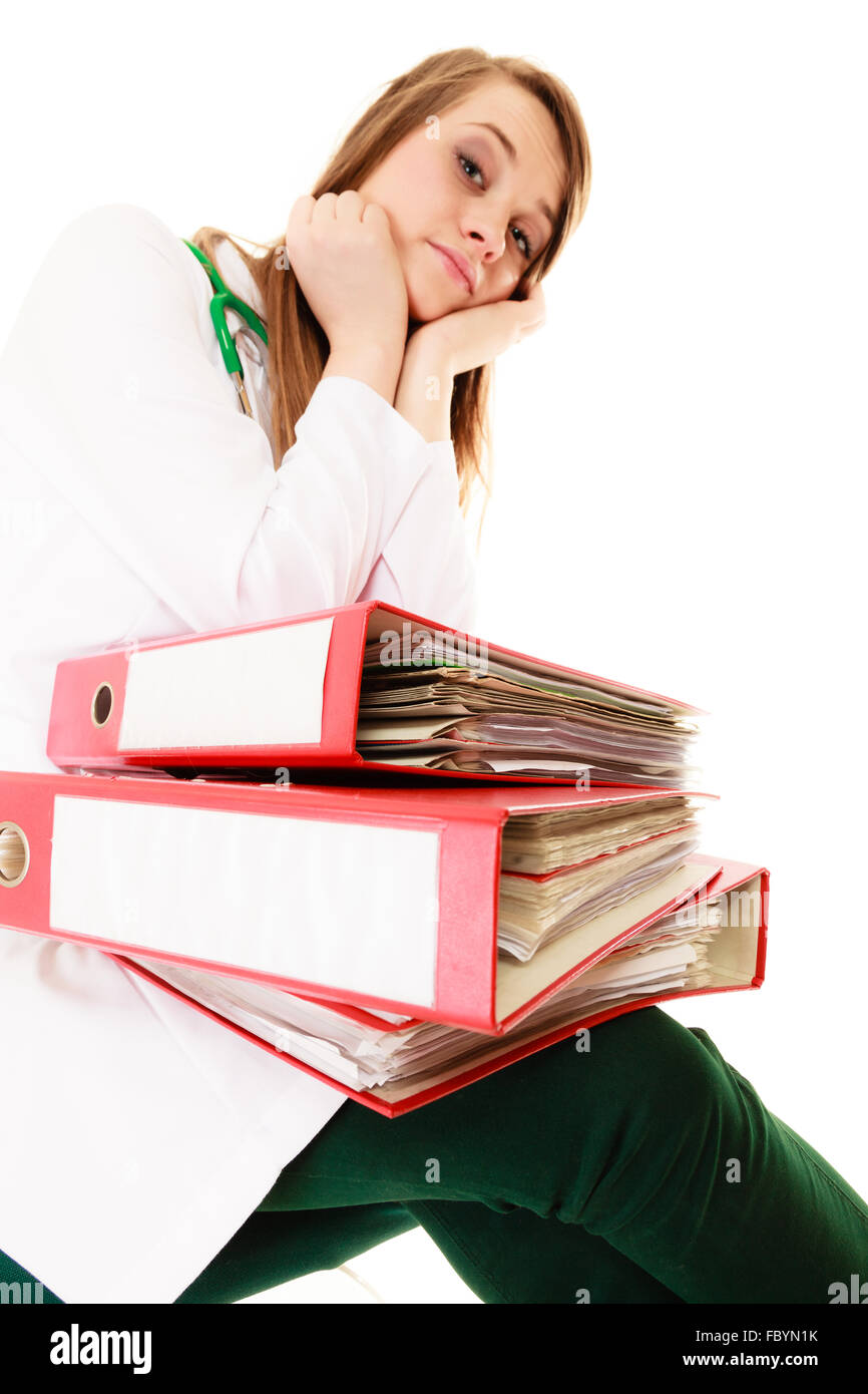 Paperwork. Overworked doctor woman with documents Stock Photo