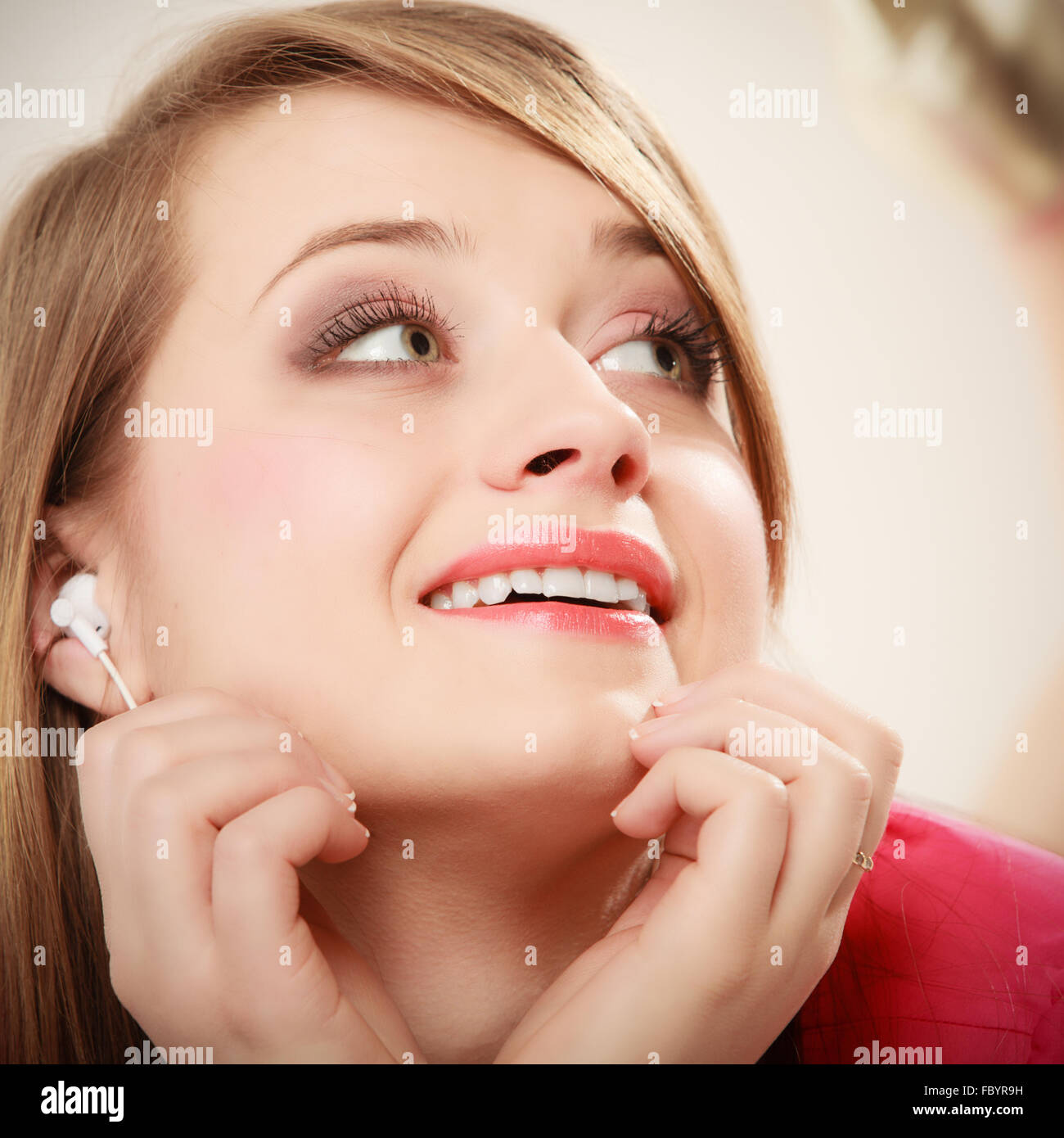 Girl with white headphones listening to music Stock Photo Alamy