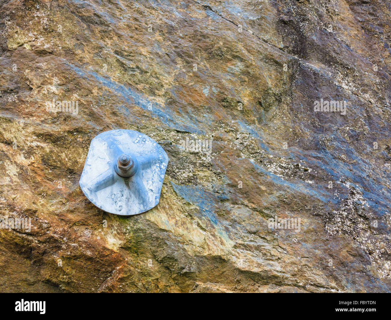 wall stone solid nature rock with construction steel Stock Photo
