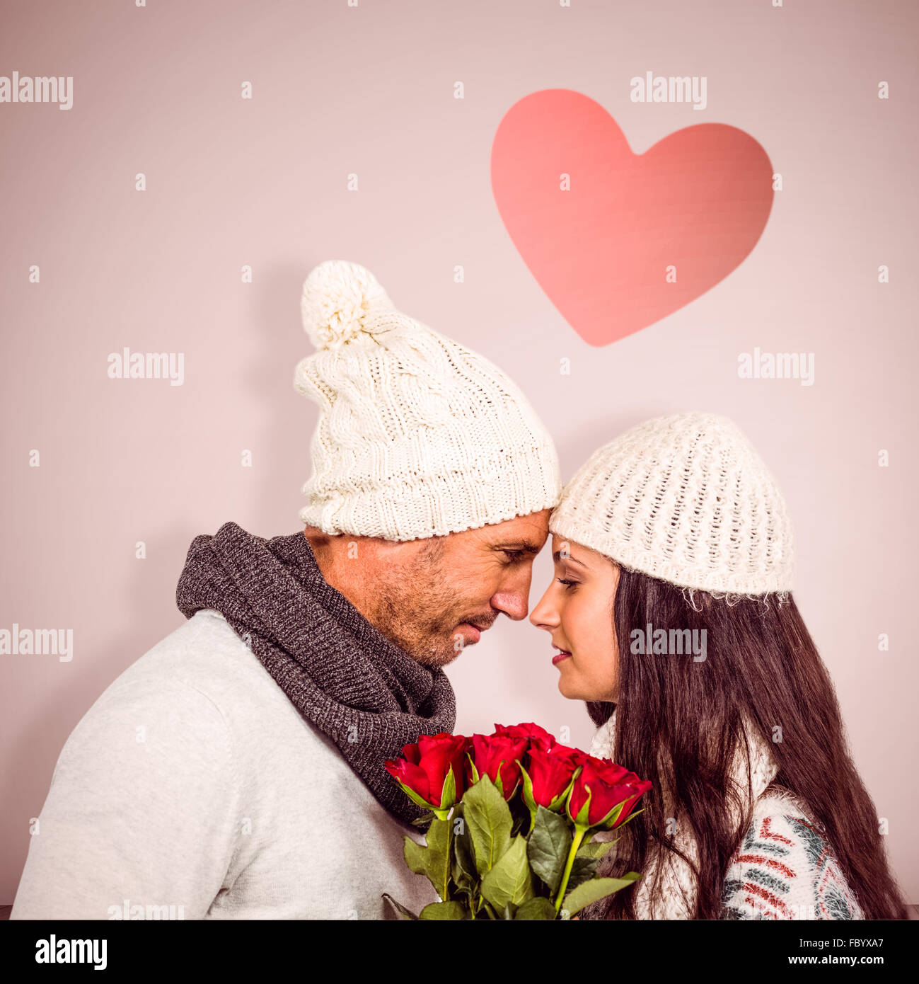 Composite image of smiling couple nosetonose holding roses bouquet