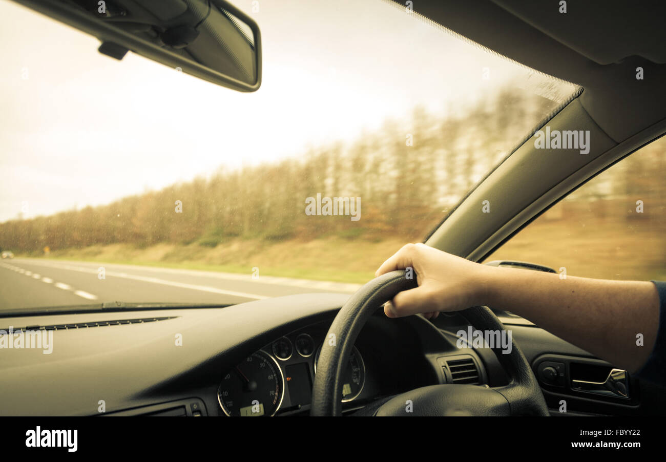 Driver hands on steering wheel hi-res stock photography and images - Alamy